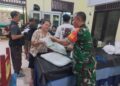 BABINSA KORAMIL 0201-05/MB DAMPINGI PENYALURAN BANTUAN BERAS KEMENSOS KEPADA 392 KK DI HAMDAN