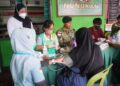 Semangat HUT ke-81 TNI, Satgas Pamtas Yonkav 8 Kostrad Hadir Berikan Pelayanan Kesehatan bagi Masyarakat Perbatasan
