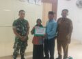 Babinsa Koramil 03/Sungai Sariak Dampingi Penyaluran BLT DD di Nagari lareh Nan Panjang Sungai Sariak