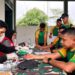 Semarak HUT ke-81 TNI di Perbatasan, Satgas Yonarmed 13/Nanggala Perkuat Kemanunggalan dengan Rakyat