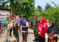 Dengar Aspirasi Pembangunan Warga, Koramil 10/TM Sinergi Mendampingi Kunjungan Kerja Bupati Labusel di Desa Air Merah