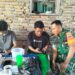 Babinsa Mabar Hilir Sosialisasikan Penerimaan TNI AD, Bimbing Dua Pemuda Mendaftar Secara Online