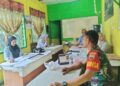 Babinsa Kunjungi Kantor Pasar, Pererat Silaturahmi dan Jalin Koordinasi dengan Pengelola
