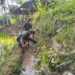 Wujud Kemanunggalan TNI Dan Rakyat, Babinsa Kedungbanteng Bersama Warga Gotong Royong Bersihkan Irigasi Sawah
