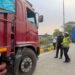 Polisi Bersama Masyarakat KA Induk Korlantas Polri BSD Himbauan dan Edukasi Bagi Sopir Truk Over Dimension Over Loading
