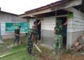 Kepedulian TNI Menyentuh Rumah Ibadah, Satgas TMMD Bersihkan dan Cat MCK di Boangmanalu